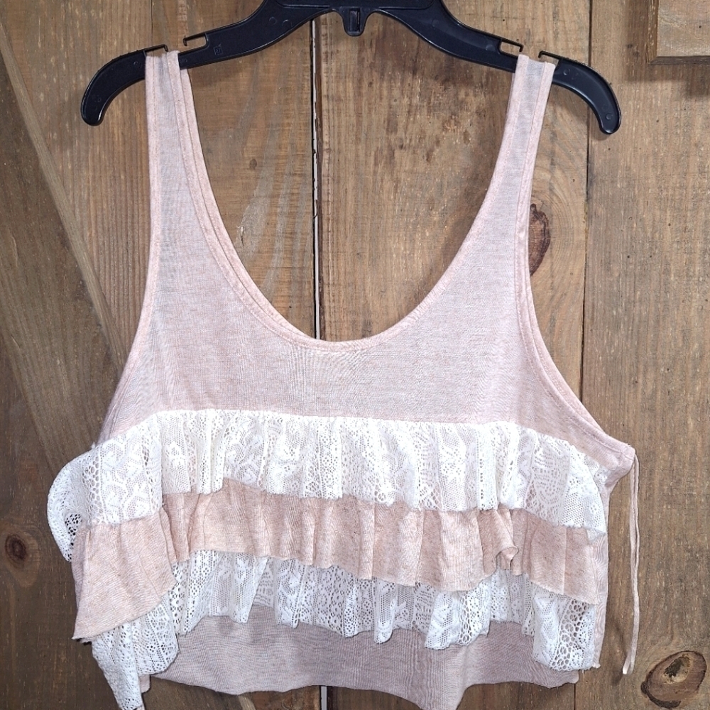 A Free People tiered cropped tank top with ruffled bodice in a size Small Petite